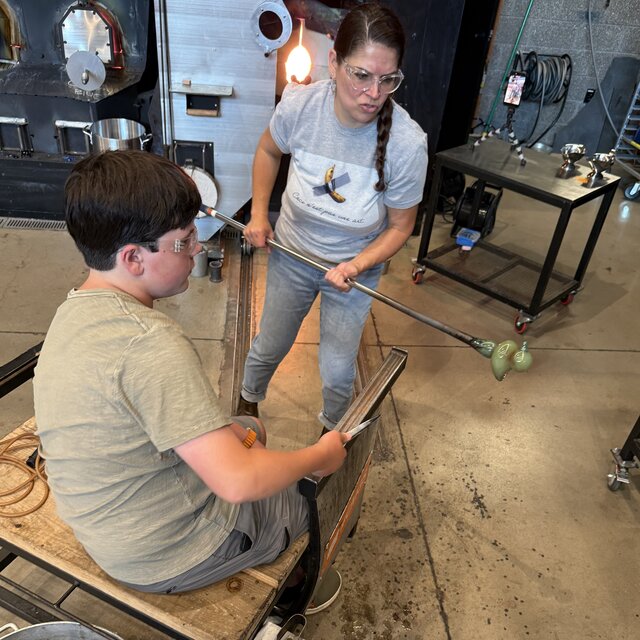 Working hot glass at the bench