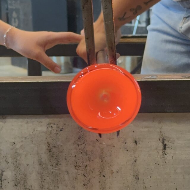 Close-up using jacks to shape hot glass